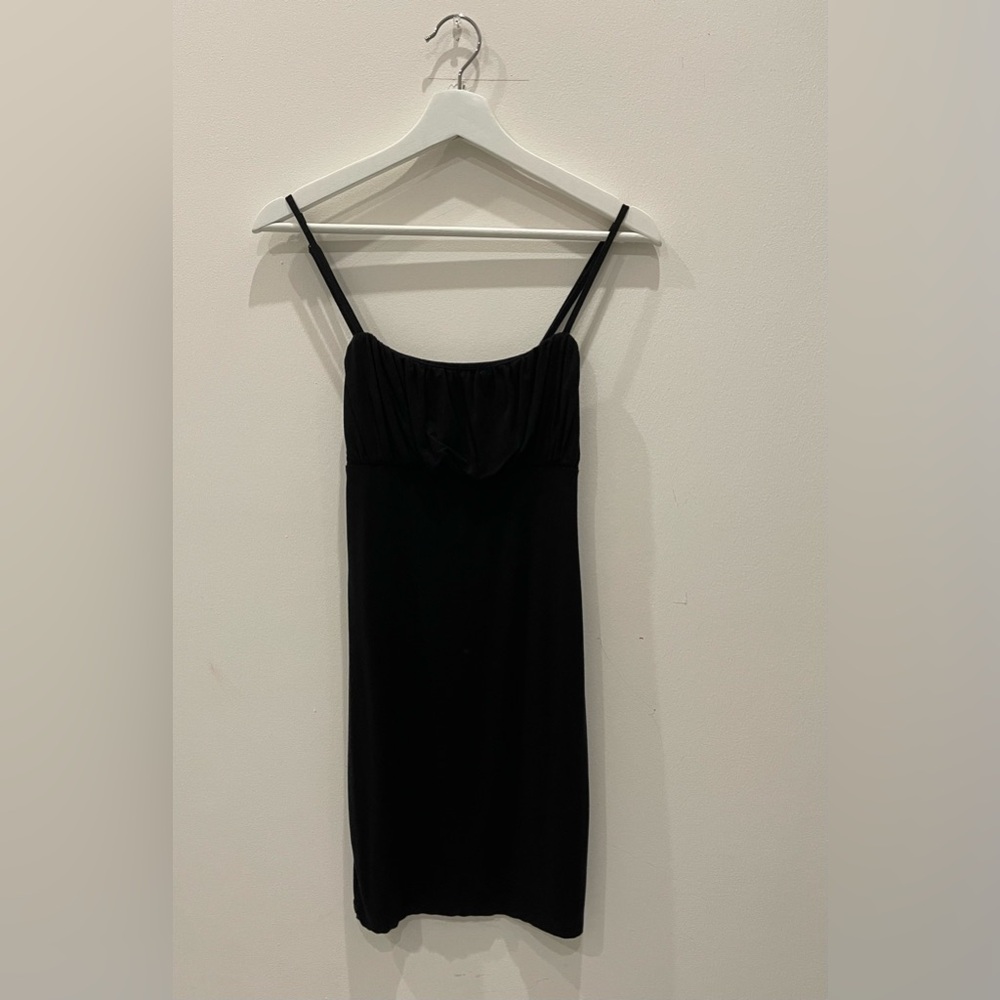 Short black dress XS with ruffled top from Garage.